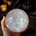 Large clear rainbow quartz crystal sphere, 4.5 inches