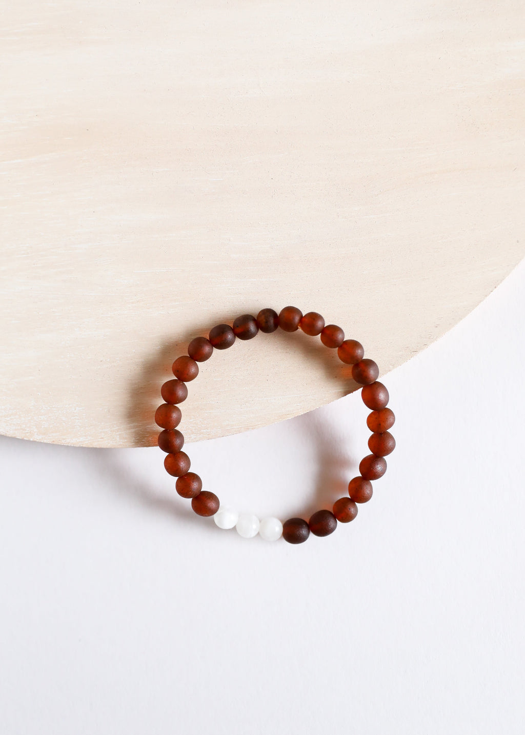 Raw cognac Baltic amber and moonstone stretch bracelet