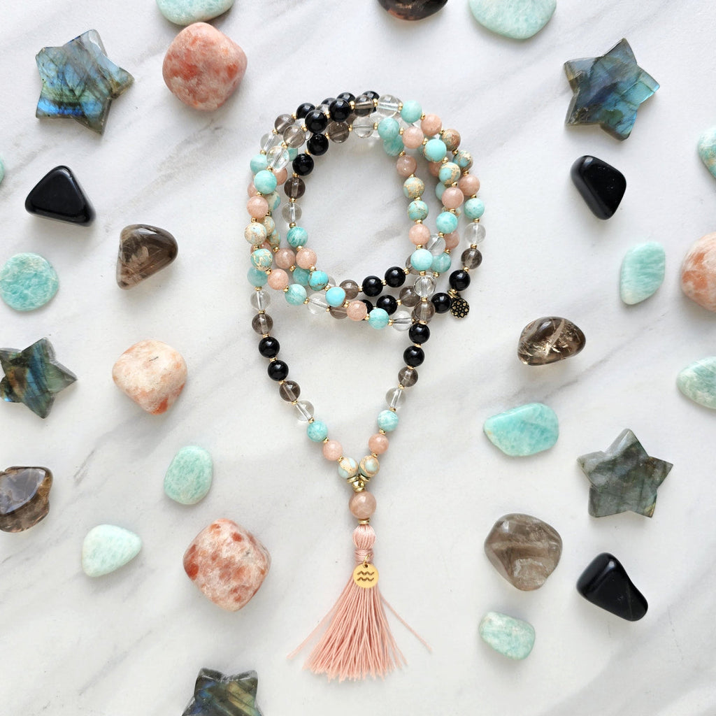 Aquarius zodiac mala necklace with sea sediment jasper and sunstone beads, Aquarius charm and tassel, view 4