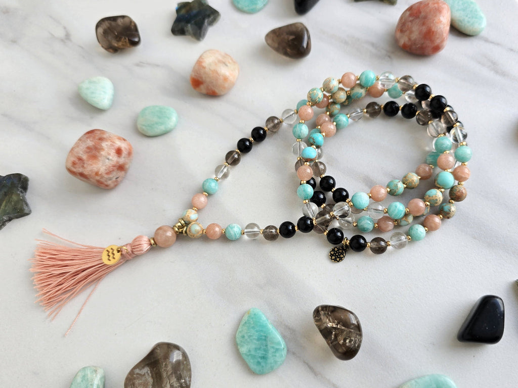 Aquarius zodiac mala necklace with sea sediment jasper and sunstone beads, Aquarius charm and tassel, view 5