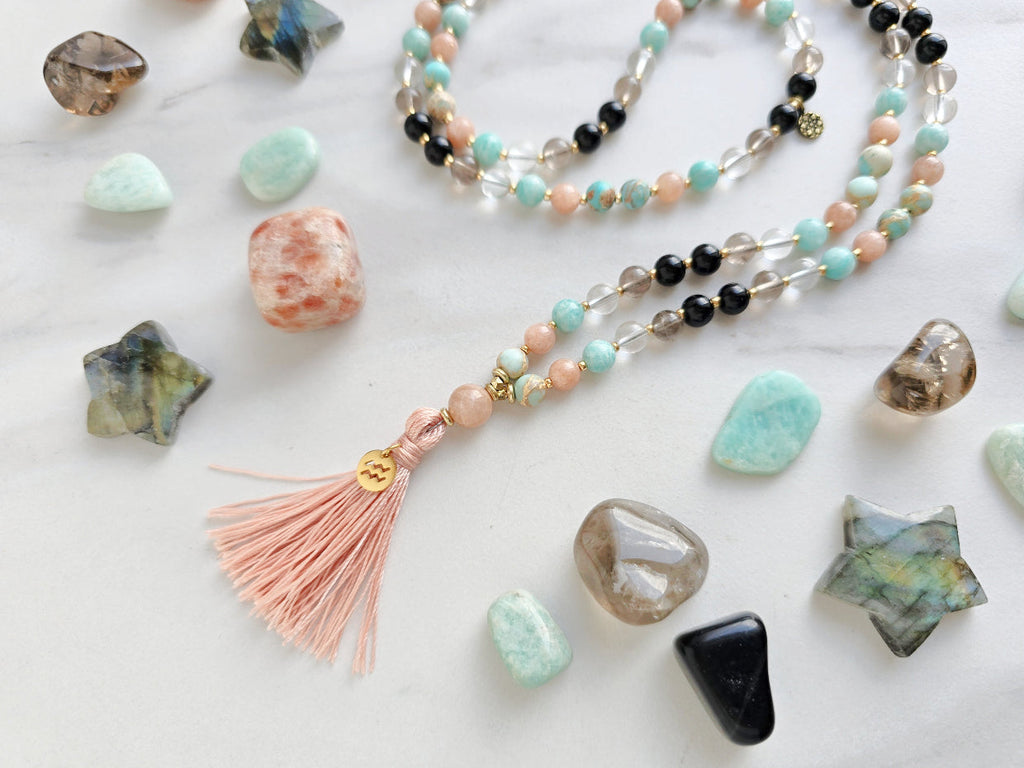 Aquarius zodiac mala necklace with sea sediment jasper and sunstone beads, Aquarius charm and tassel, view 2