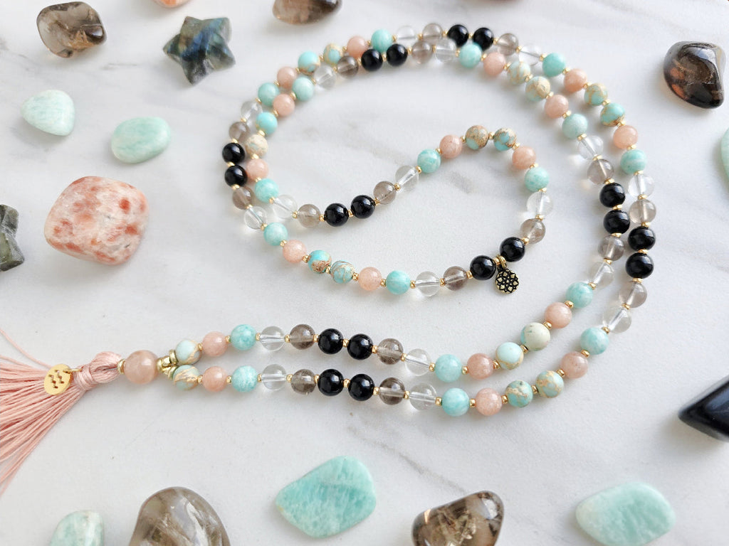Aquarius zodiac mala necklace with sea sediment jasper and sunstone beads, Aquarius charm and tassel, view 3