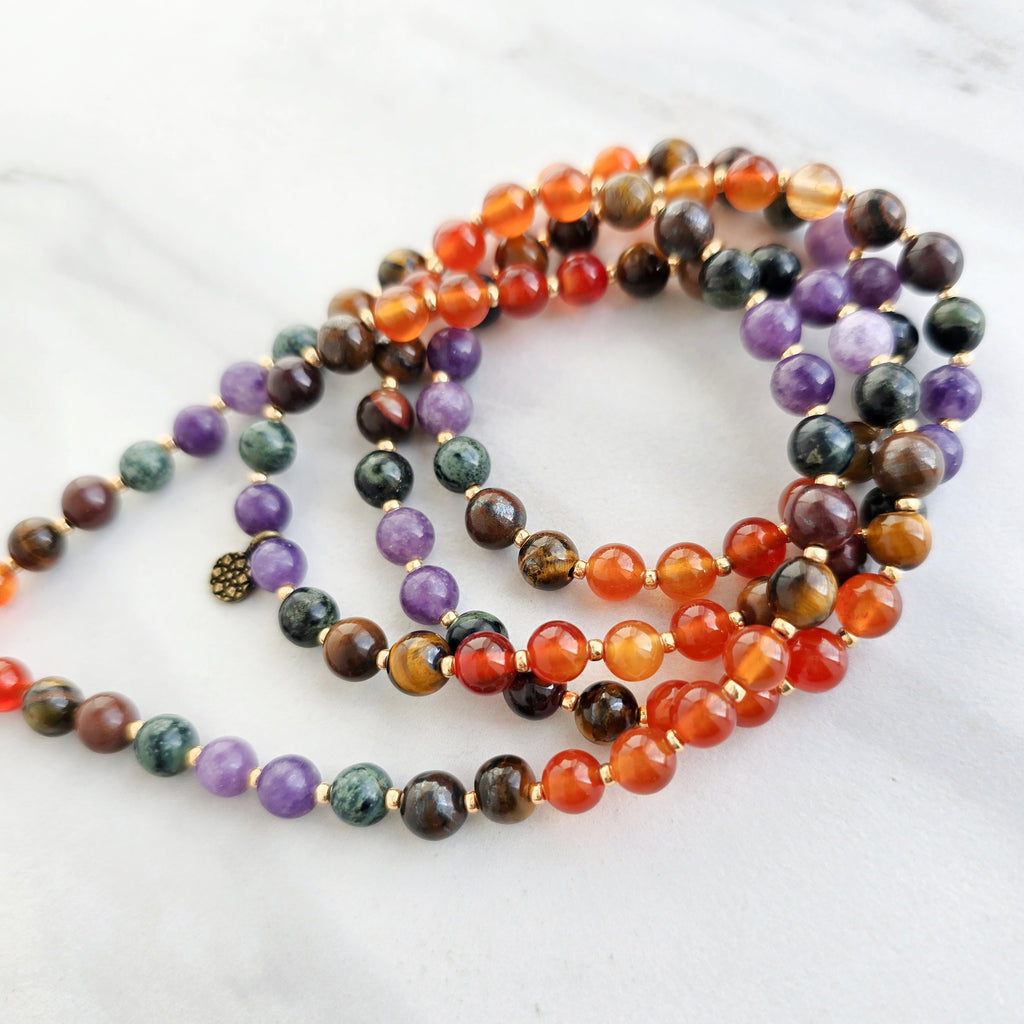 Aries zodiac mala necklace with carnelian and ironstone beads, Aries charm and tassel, view 3