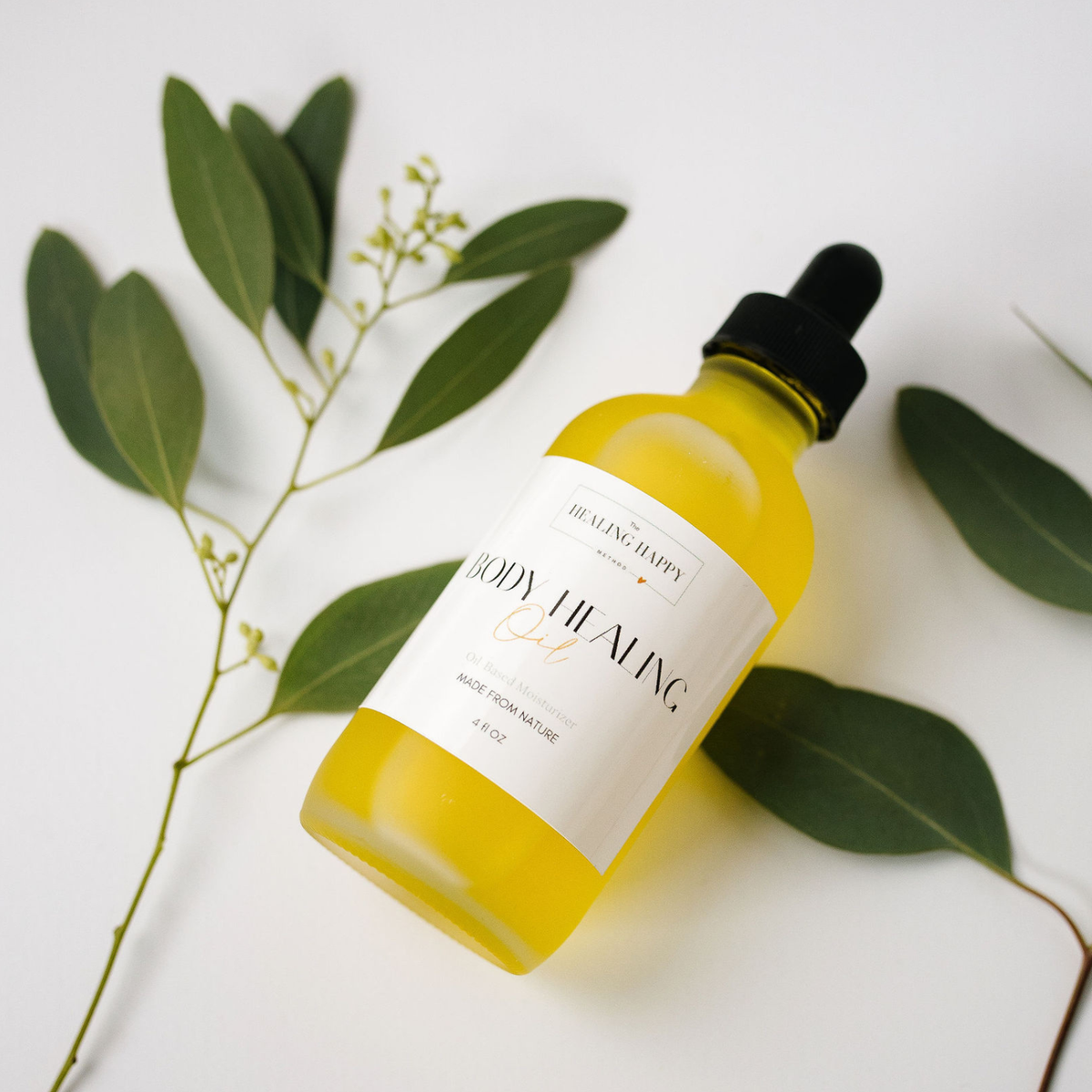 Glow Up organic body oil dropper bottle
