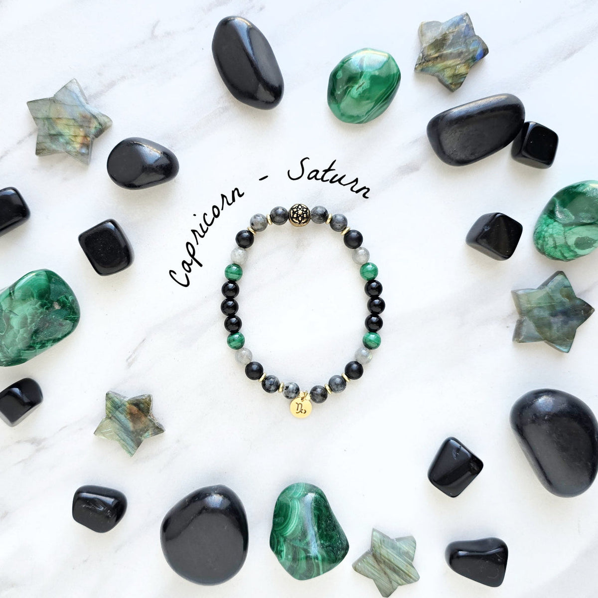Capricorn zodiac gemstone stretch bracelet with larvikite and shungite beads and Capricorn charm