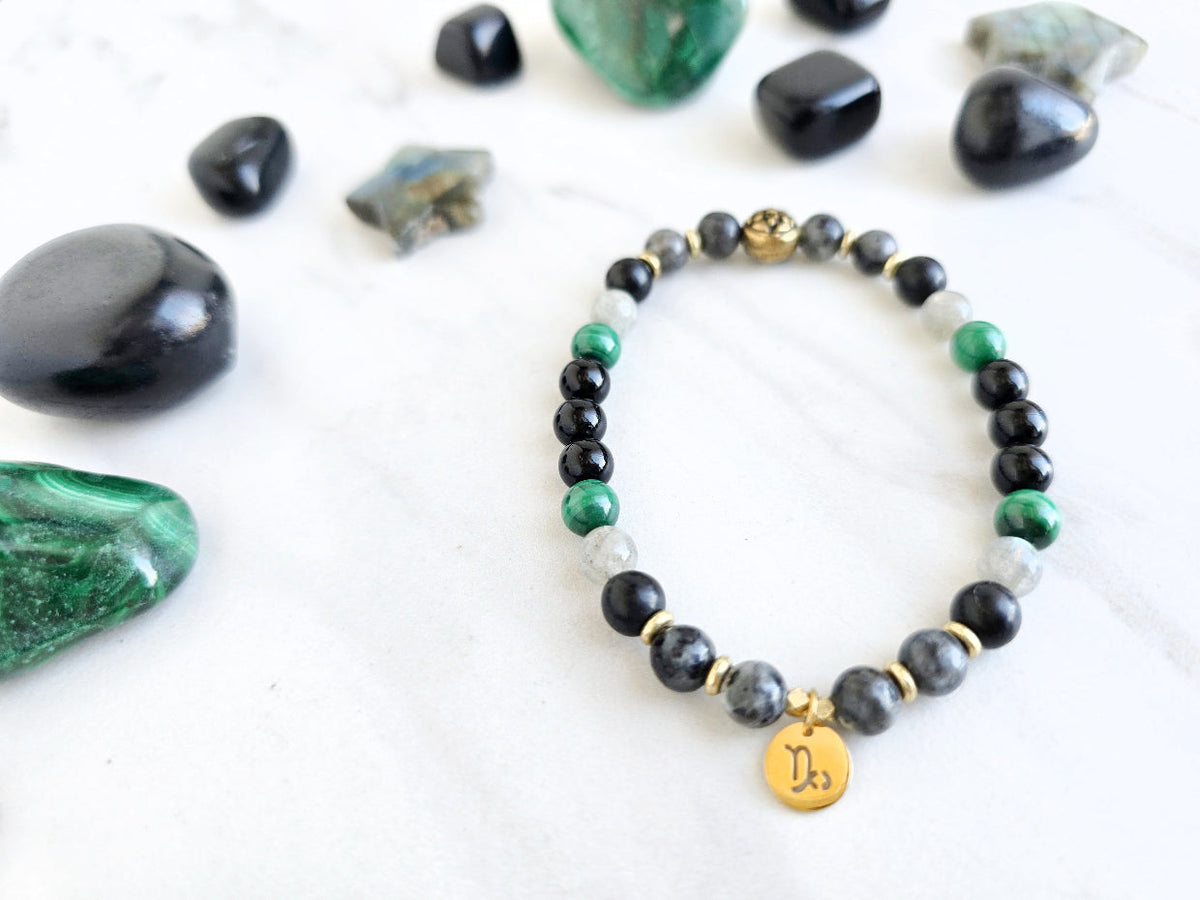 Capricorn zodiac gemstone stretch bracelet with larvikite and shungite beads and Capricorn charm, view 3