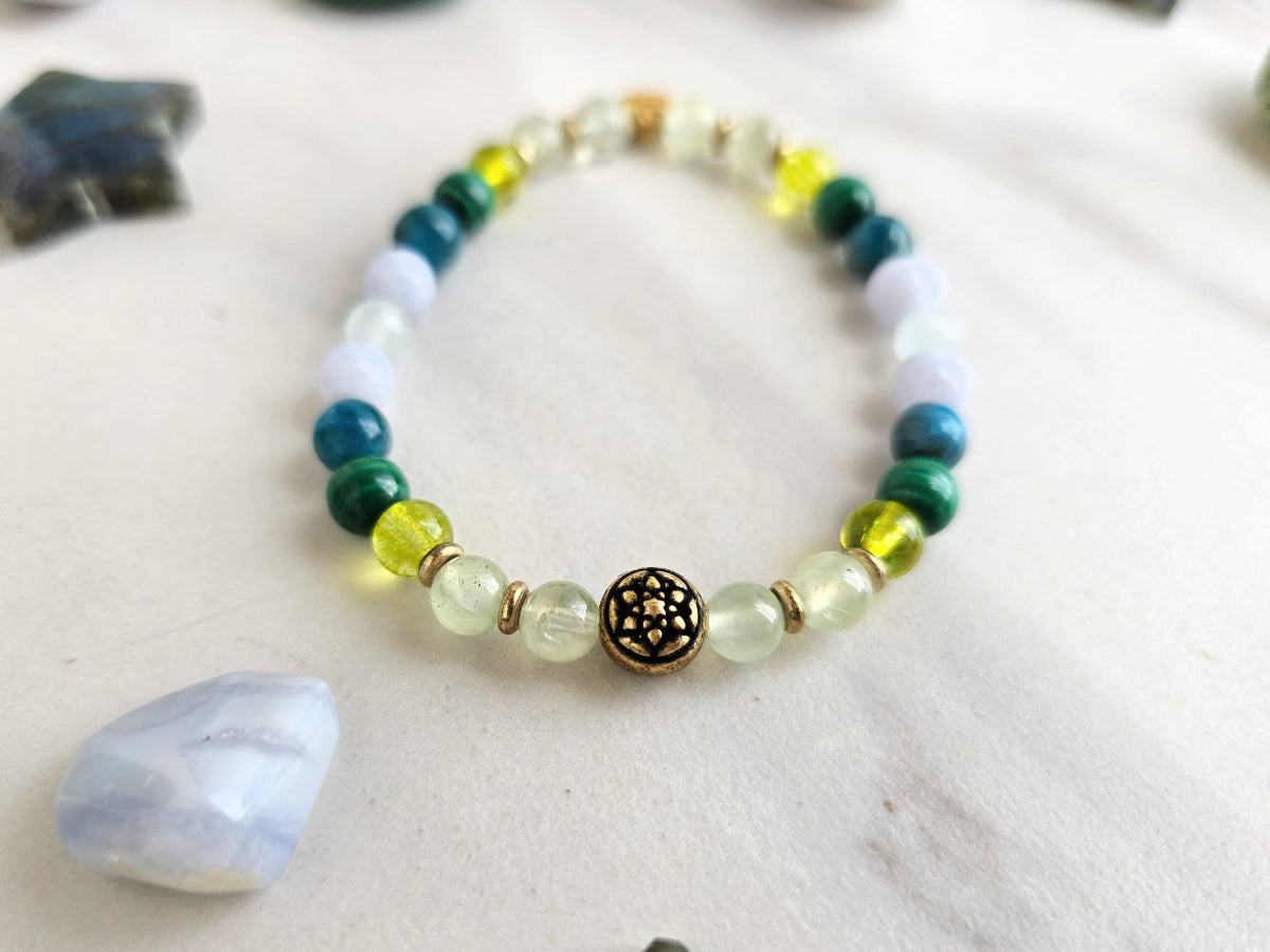 Gemini zodiac gemstone stretch bracelet with prehnite and peridot beads and Gemini charm, view 4