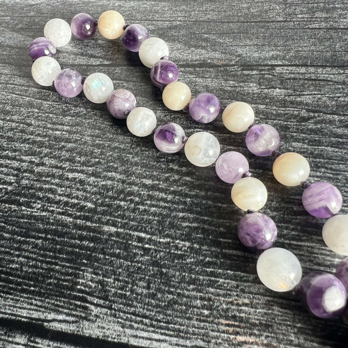 27-bead amethyst and moonstone third eye wrist mala, view 4