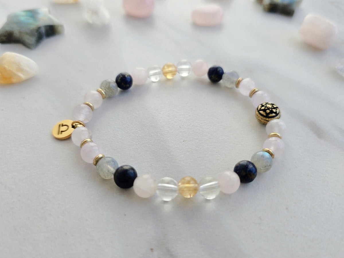 Libra zodiac gemstone stretch bracelet with lapis lazuli and kunzite beads and Libra charm, view 2