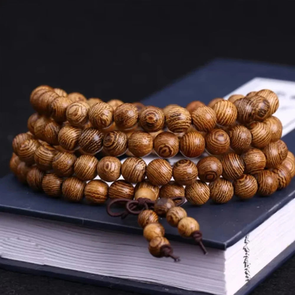 Sandalwood 108-bead prayer mala wrapped as a bracelet, view 6