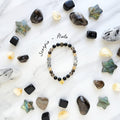 Scorpio zodiac gemstone stretch bracelet with obsidian and smoky quartz beads and Scorpio charm
