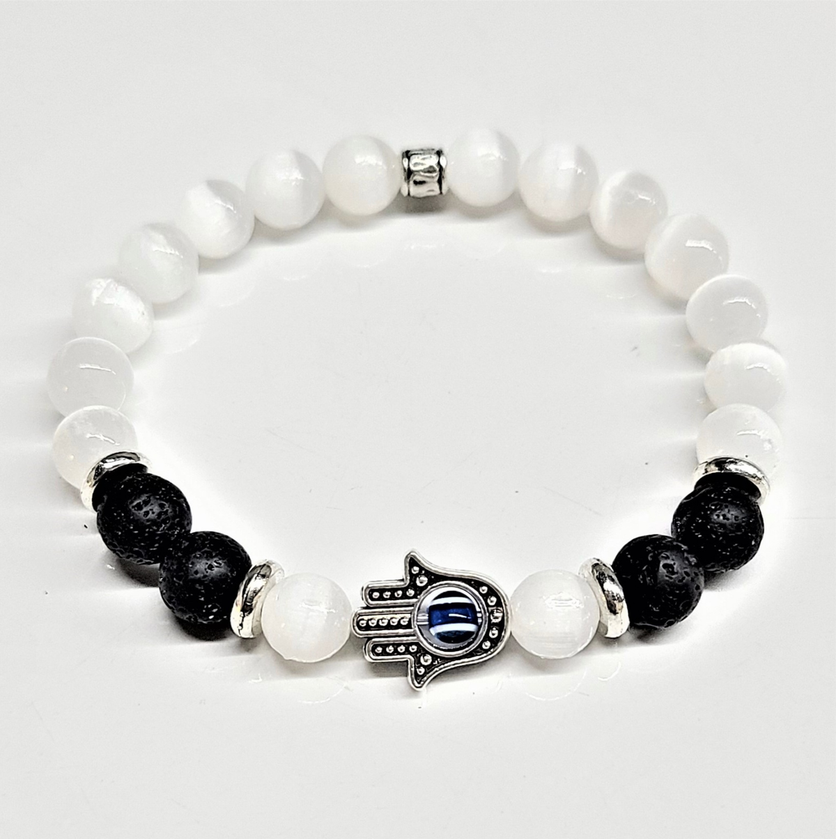 Selenite and lava stone bead bracelet with hamsa charm