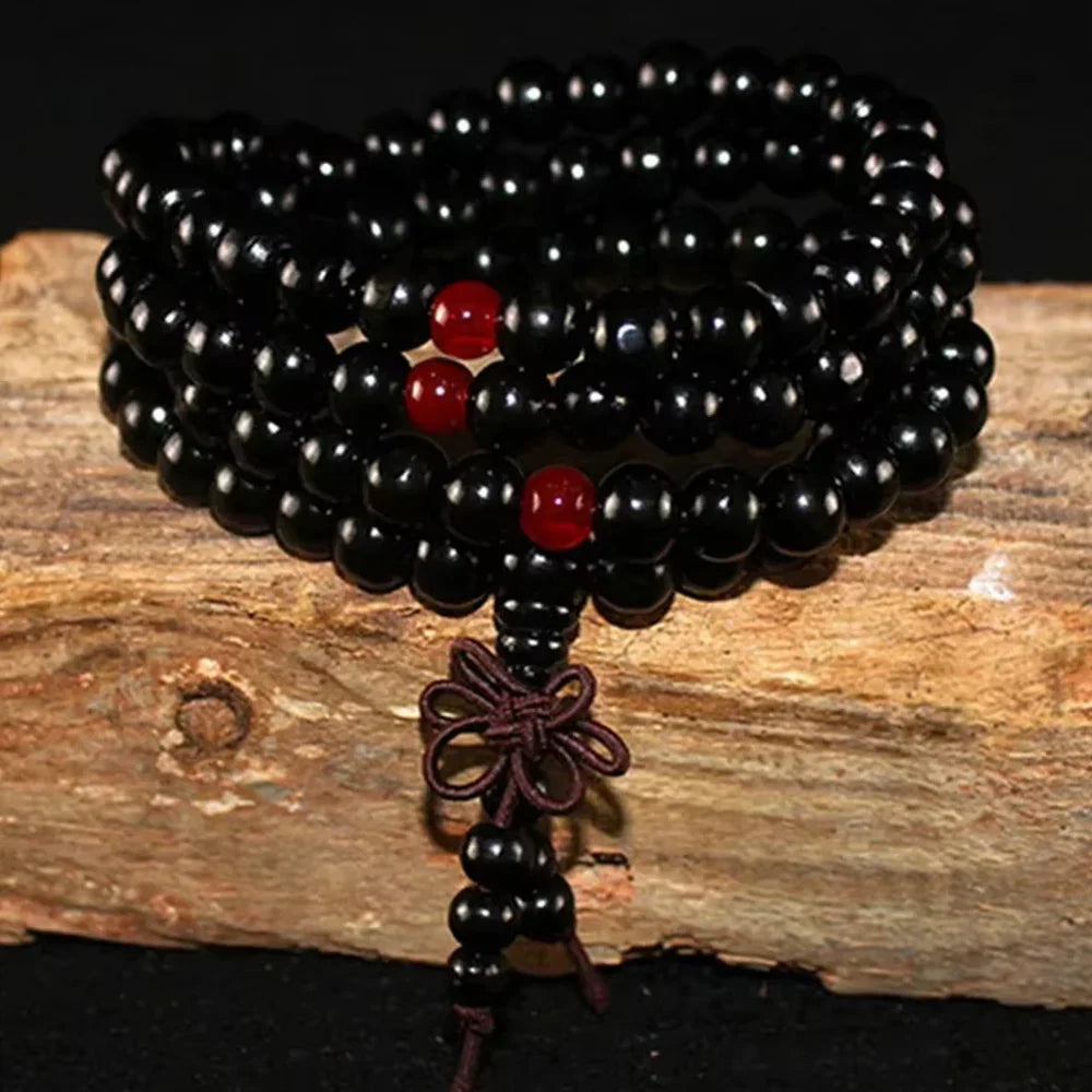 Sandalwood 108-bead prayer mala wrapped as a bracelet, view 3