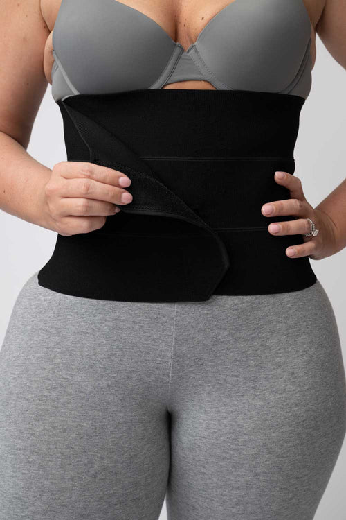 Black 3-panel post-op abdominal binder with hook-and-loop closure, view 2