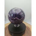 Large polished dream amethyst crystal sphere