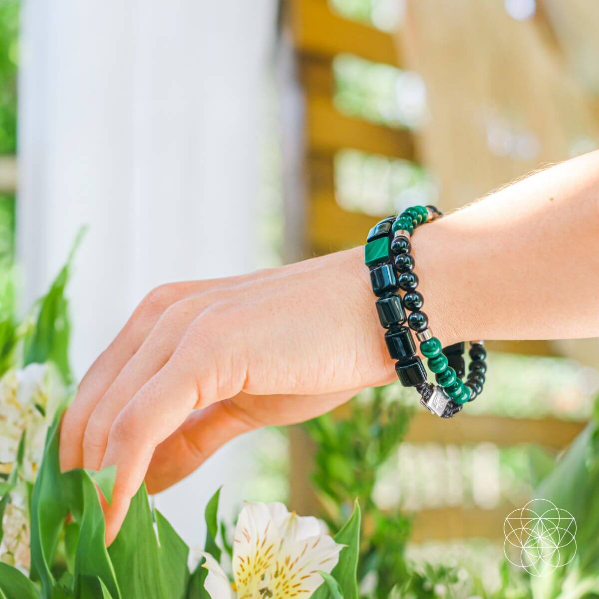 Malachite and black onyx bracelet set with open-hand charm, view 7