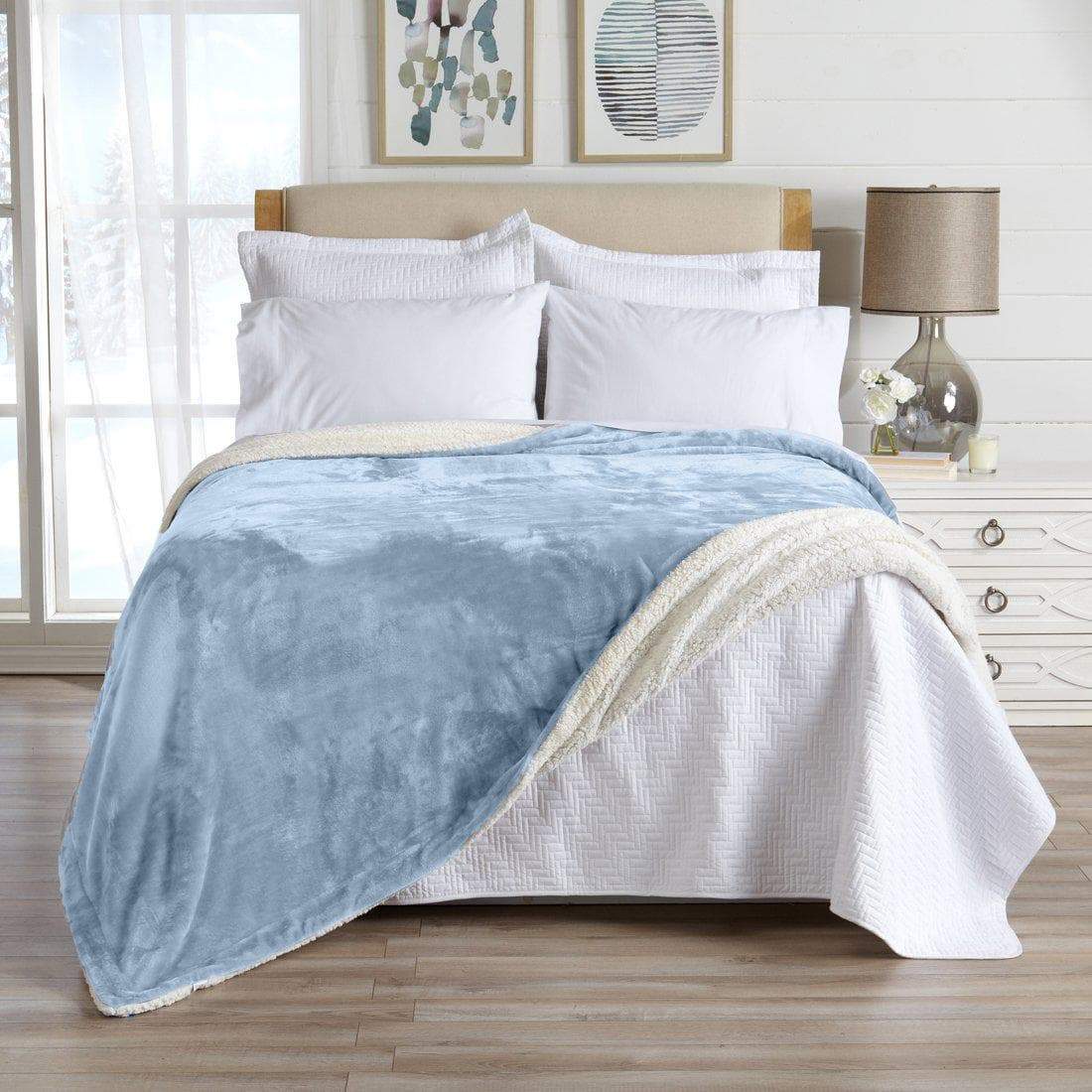 Great Bay Home velvet plush sherpa blanket folded on a bed