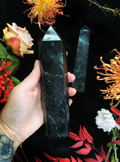 Large astrophyllite crystal tower with golden star patterns