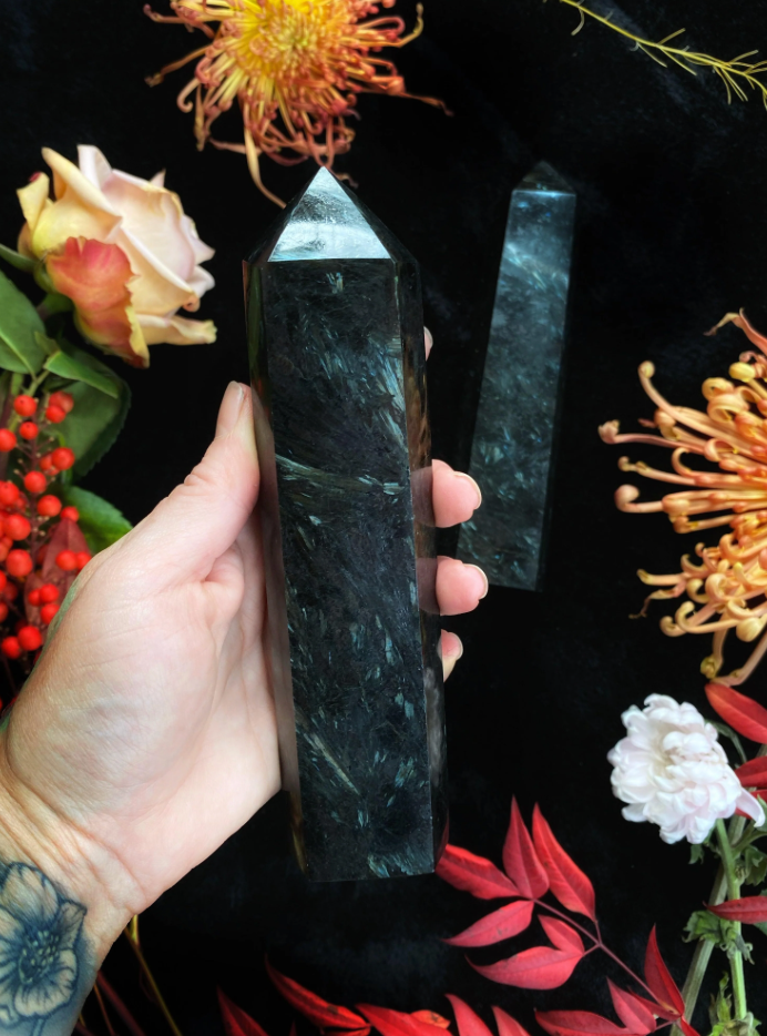 Large astrophyllite crystal tower with golden star patterns
