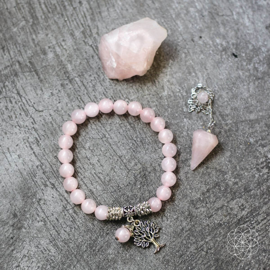 Rose quartz crystal set with stone, bracelet and pendulum